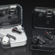 The original Nothing Ear (1) wireless earbuds (left) next to the new Ear (1) black edition (right).